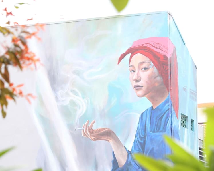 Smoking samsui woman mural to be retained in full, building owner fined for not seeking approval