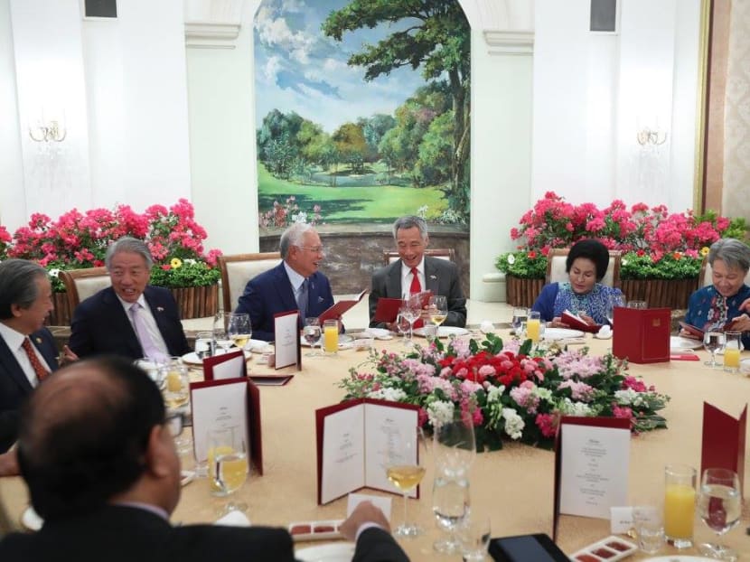 PM Lee and Mr Najib having a discussion over lunch. Photo: Facebook @Lee Hsien Loong