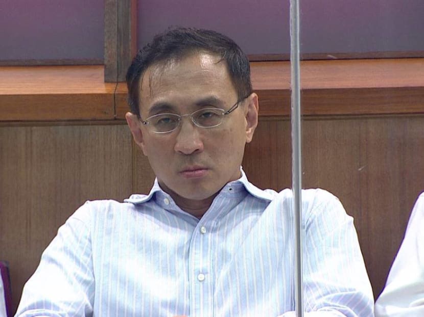 SMRT's Chief Executive Officer Desmond Kuek attends Tuesday's Parliamentary session, where Transport Minister Khaw Boon Wan spoke about the tunnel flooding incident that shut down a segment of the North-South Line for about 20 hours last month. Photo: Parliament TV screen capture