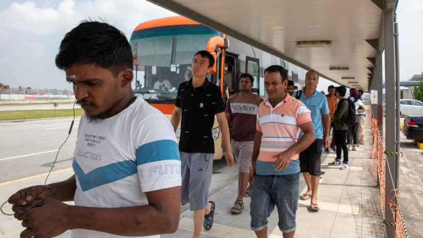 Migrant workers at Tanah Merah dorm have to wait hours for shuttle bus; operator says it's only a peak-period problem