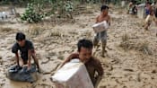 Starvation fears as Indonesia flood deaths rise over 900