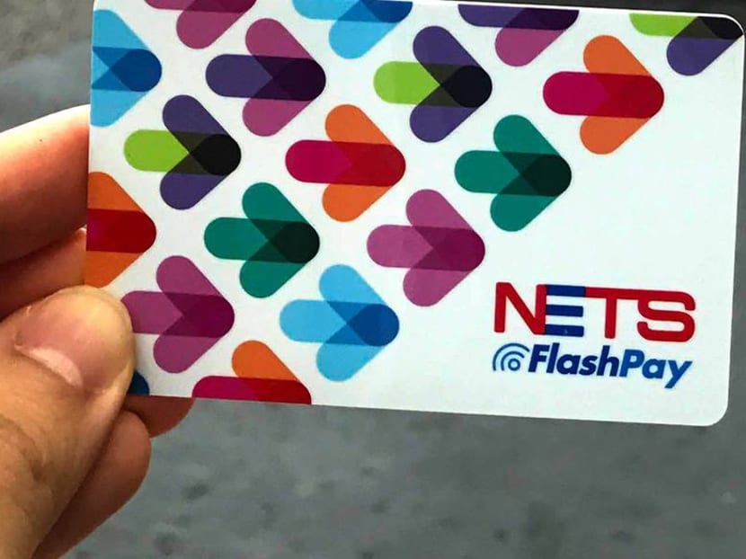 A sample of a Nets Flashpay card that holds stored cash value for electronic payments.