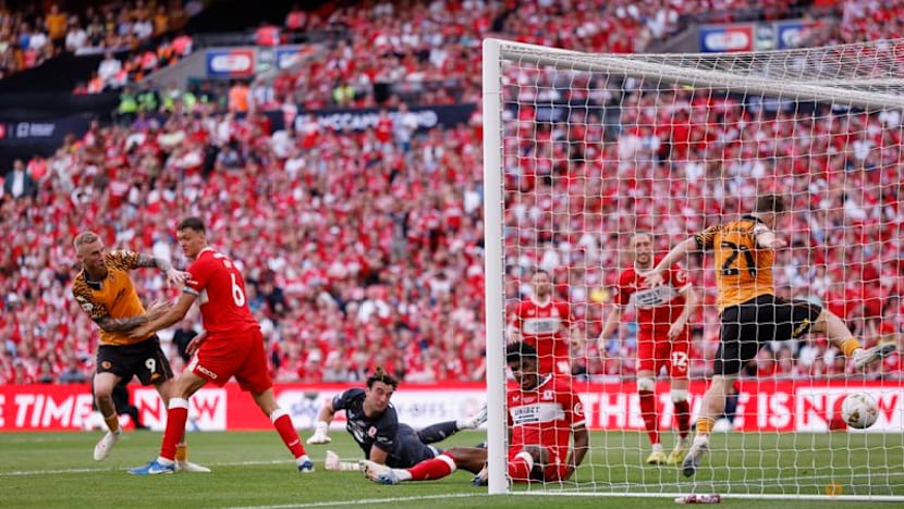 Hull back in Premier League after McBurnie's last-gasp playoff winner