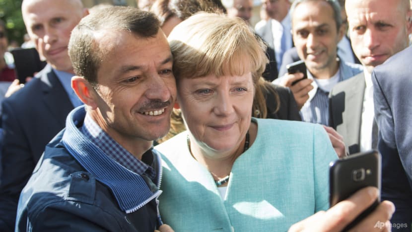 Merkel wins UN refugee agency award over welcome of Syrians Merkel wins UN refugee agency award over welcome of Syrians