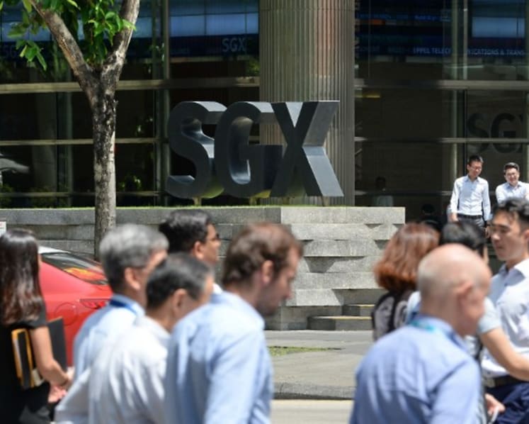 Take shelter in Singapore banks, defensive stocks amid trade worries, ‘ghost of August’: Analysts