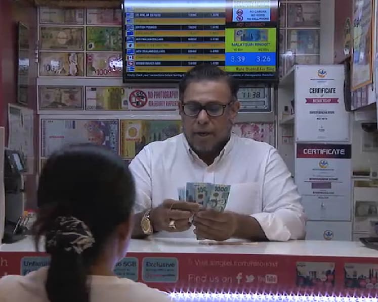 Some money changers in Singapore see booming business, as travel takes off after borders reopen