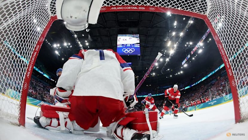Ice hockey-Canada thrash France 10-2, Swiss top Czechs in OT, Denmark down Latvia