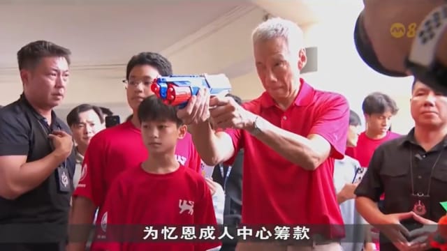 国初办嘉年华为忆恩成人中心筹款 李总理回母校支持