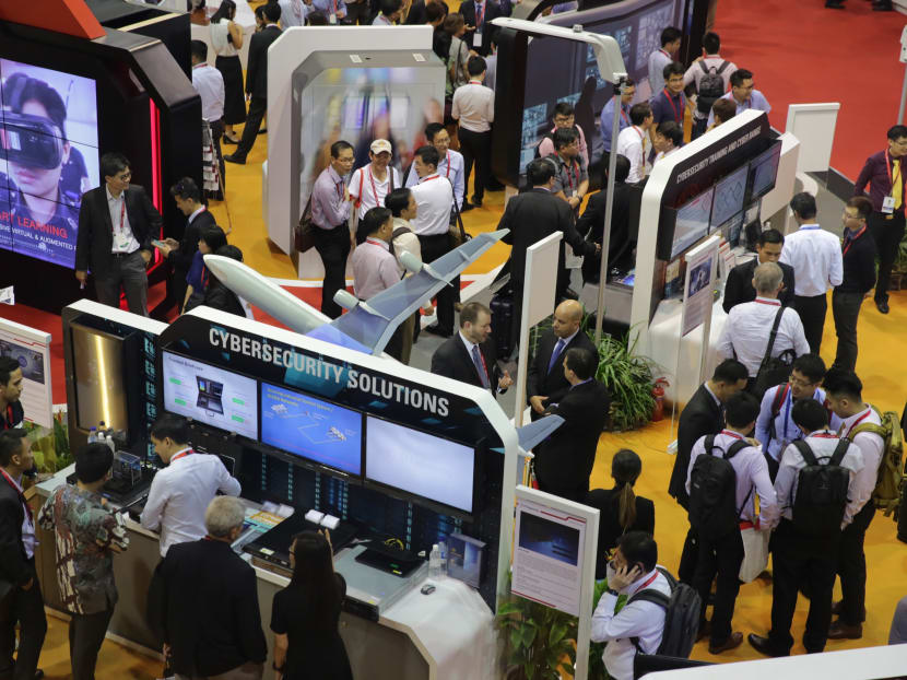 Visitors are seen at the Singapore Airshow’s Trade Fair on Feb 7. Photo: Najeer Yusof/TODAY