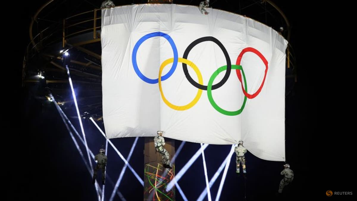 France welcomes Olympic flag as 2030 Winter Games loom