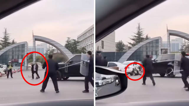 河南男子持刀与警对峙 司机见义勇为开车将他撞飞制伏