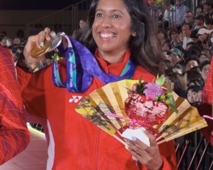 Sprint queen Shanti Pereira celebrates at post-race event in Nagoya