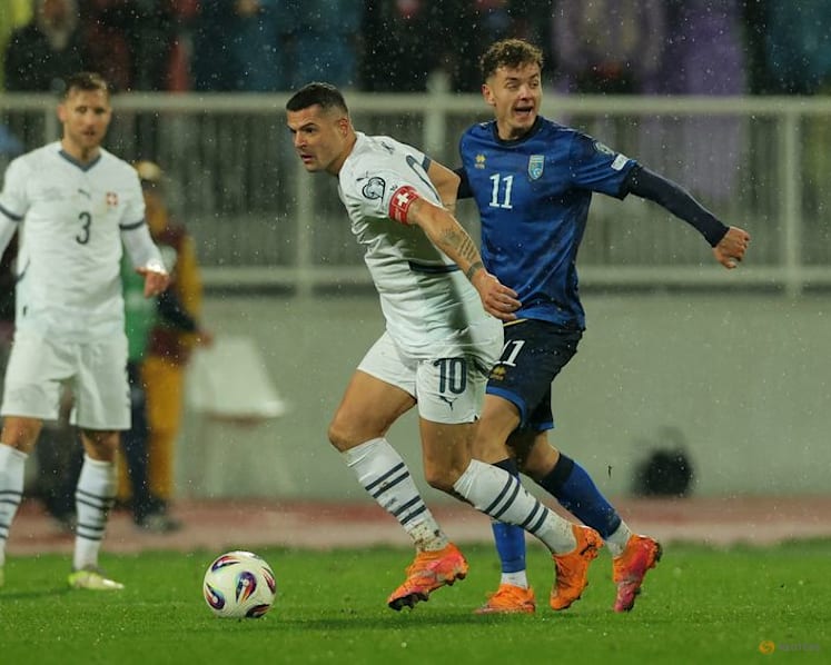 Switzerland seal World Cup place despite Kosovo fightback