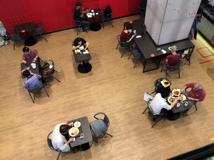 An eatery at Chinatown Point mall where customers were still seated at two-to-a-table on July 19, 2021. An eatery at Chinatown Point mall where customers were still seated at two-to-a-table on July 19, 2021.