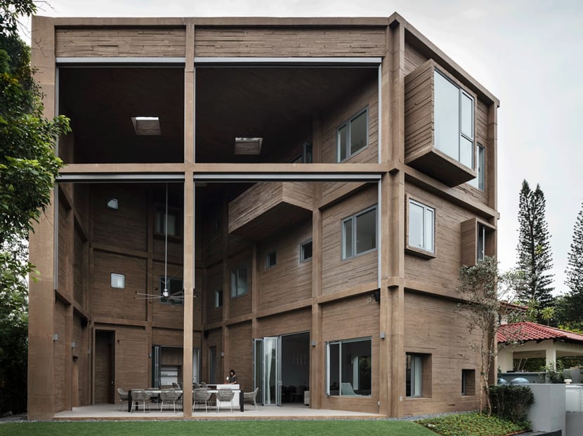 In this Singapore home, a family bonds over meals in a 3 storey-high patio with a view