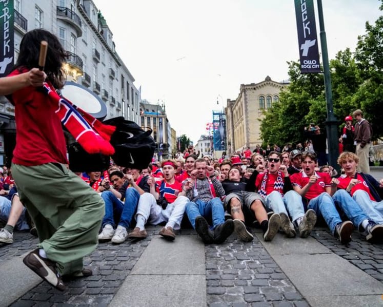 No regrets for no-row Norway fan caught sitting still on TV 