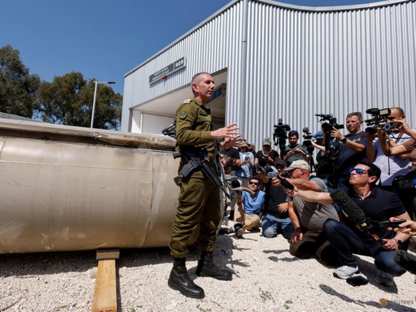Israeli military spokesperson Rear Admiral Daniel Hagari speaks to the media as Israel's military displays what they say is an Iranian ballistic missile which they retrieved from the Dead Sea after Iran launched drones and missiles towards Israel, at Julis military base, in southern Israel on April 16, 2024. 