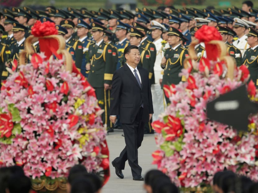 Chinese President Xi Jinping arrives to attend a tribute ceremony in front of the Monument to the People's Heroes at Tiananmen Square, ahead of National Day marking the 68th anniversary of the founding of the People's Republic of China in Beijing, China on September 30, 2017. Photo: Reuters