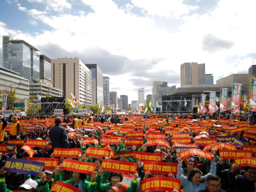 Taxi drivers protest in Seoul against a carpool service by Kakao.