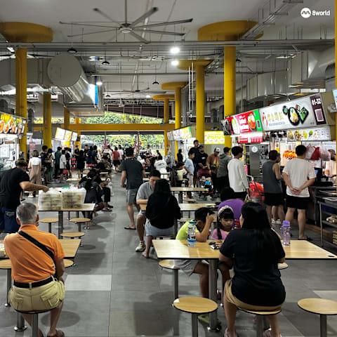 政府不直接管制食品价格 探讨集体采购助小贩降成本