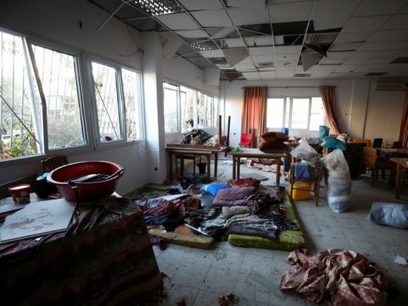 A view of the inside of Al-Ahli hospital where hundreds of Palestinians were killed in a blast that Israeli and Palestinian officials blamed on each other, and where Palestinians who fled their homes were sheltering amid the ongoing conflict with Israel,  in Gaza City, October 18, 2023.  REUTERS/Mohammed Al-Masri