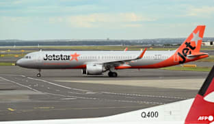 Jetstar to charge for carry-on bags in overhead lockers