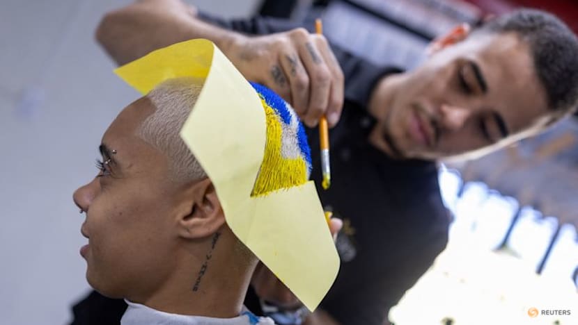 Barber shaves World Cup dreams into Brazilian fans' hair