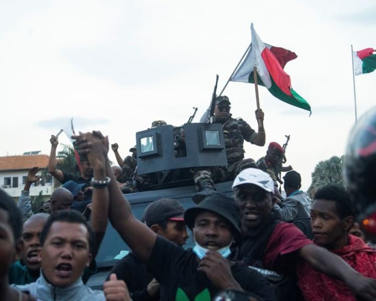 Madagascar president warns of coup attempt as more soldiers join protests