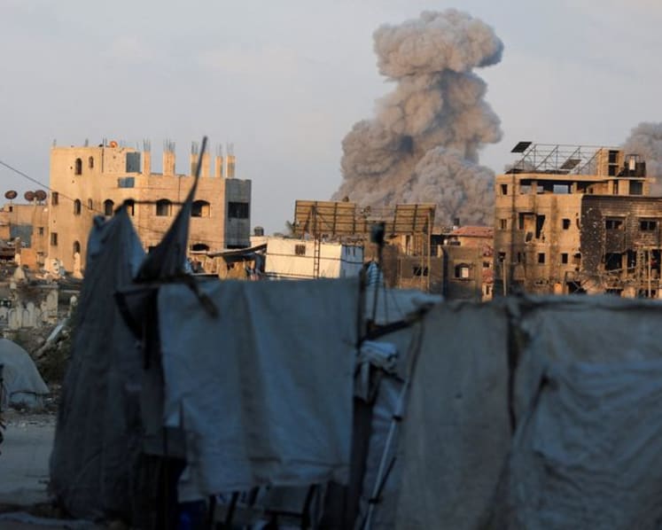 Israel pounds Gaza City as military takes first moves in offensive