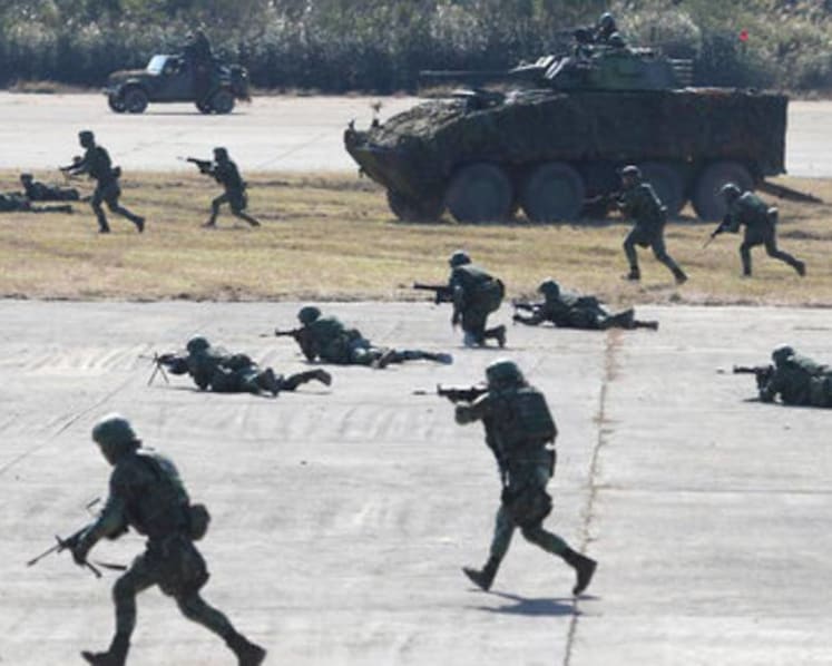 Taiwan military stages drill aimed at repelling China attack