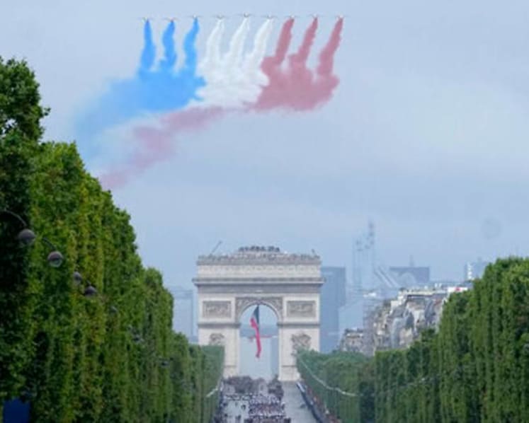 France cautiously celebrates Bastille Day, clouded by COVID-19