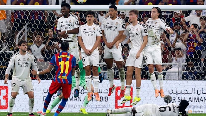 Raphinha strikes twice as Barcelona edge Real Madrid in heated Spanish Super Cup final