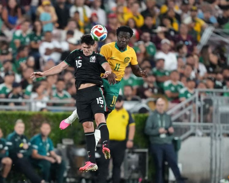 Former refugees look to ignite Australia's World Cup