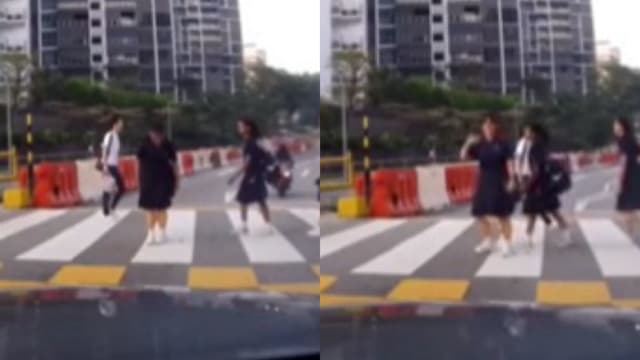 女生过斑马线向司机鞠躬致意 行为获网赞