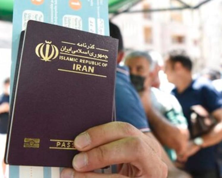 Desperate for vaccines amid surge, Iranians flock to Armenia