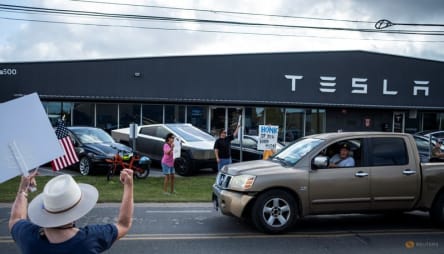 Tesla tiptoes into long-promised robotaxi service