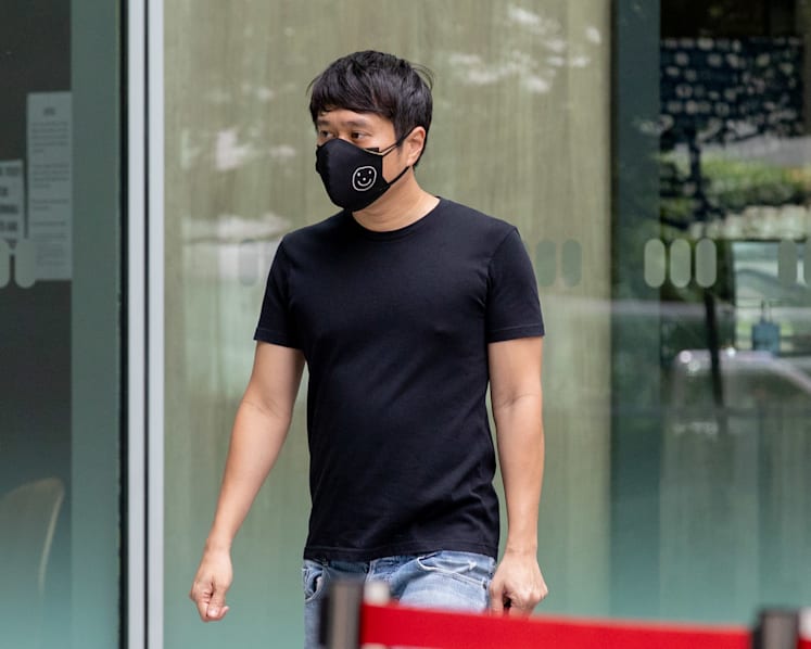 Activist Jolovan Wham fined S$3,000 over illegal assembly for holding sign outside court building