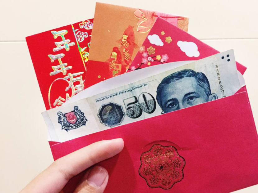 It is customary for the Chinese to give each other hongbao — or a red packet containing money — during the festival, which begins this year on Friday (Feb 16). TODAY file photo It is customary for the Chinese to give each other hongbao — or a red packet containing money — during the festival, which begins this year on Friday (Feb 16). TODAY file photo