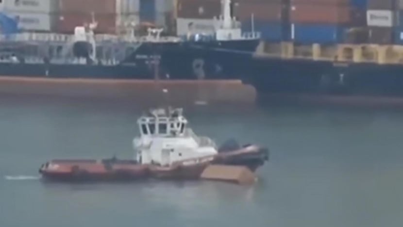 Strong winds send 15 empty shipping containers falling into sea at Keppel Terminal