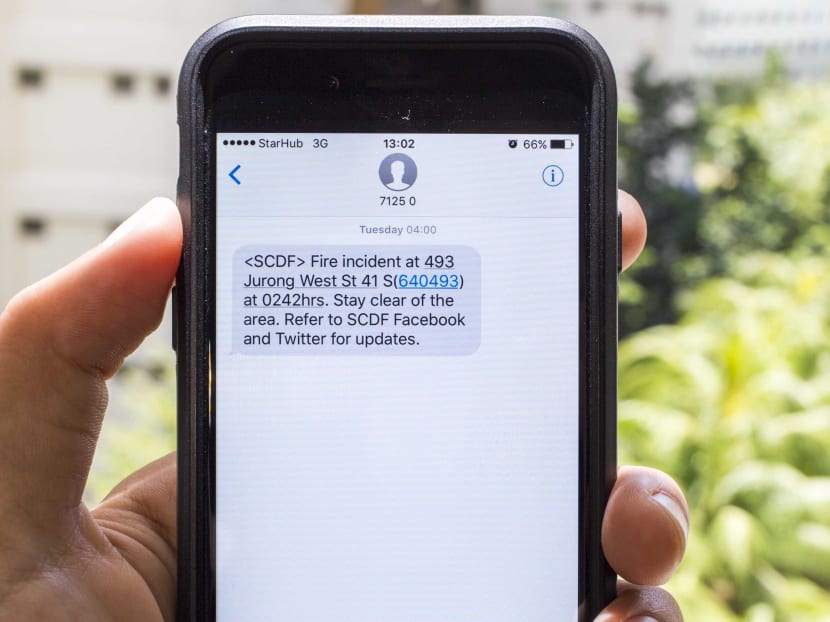 The SMS alert that was sent out to members of the public who are in the vicinity of the Jurong West market fire at 4am on Tuesday (Oct 11). Photo: Wong Pei Ting