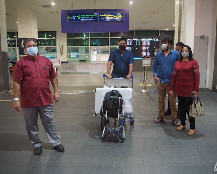 Happy reunions at klia2 as first VTL flight lands, but some teething problems for swab test process 