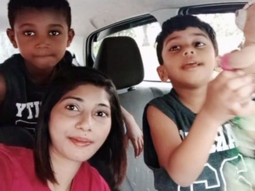 Ms Nafisah Alahu, a Malaysian still stuck in Singapore, pictured in pre-pandemic times with her two sons, now aged five and eight, whom she has not seen in close to two years. Ms Nafisah Alahu, a Malaysian still stuck in Singapore, pictured in pre-pandemic times with her two sons, now aged five and eight, whom she has not seen in close to two years.