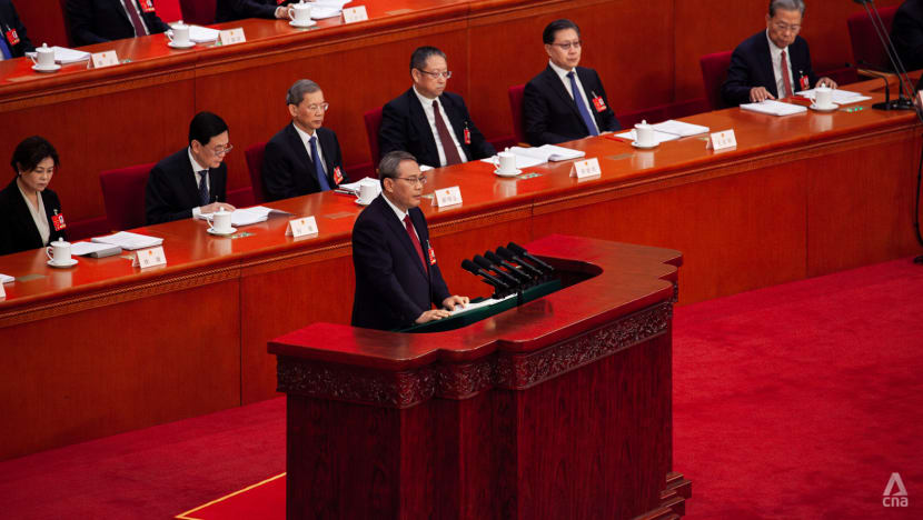 China will work to firmly advance 'reunification' with Taiwan, premier says China will work to firmly advance 'reunification' with Taiwan, premier says