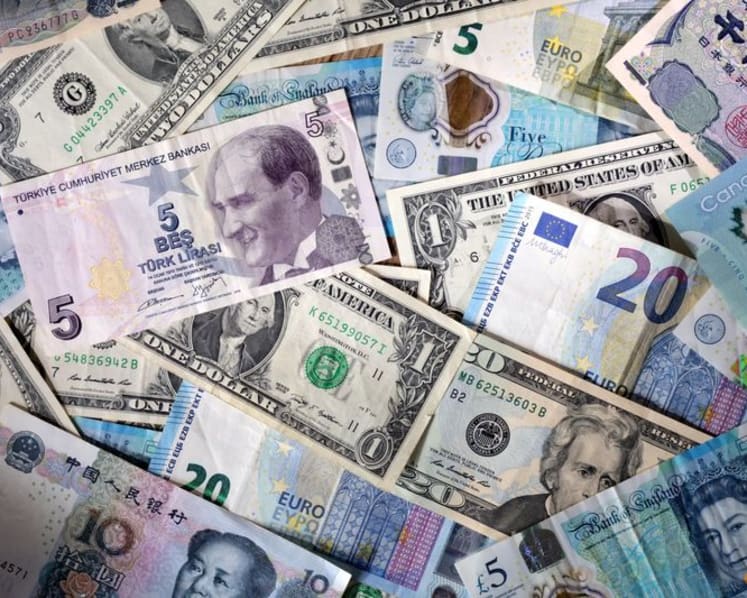 Dollar rebounds from slump spurred by Powell's dovish surprise