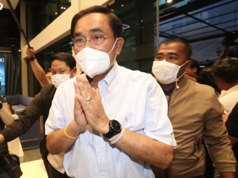 Thailand's incumbent Prime Minister Prayut Chan-o-cha arrived at the United Thai Nation Party headquarters on May 14, 2023.