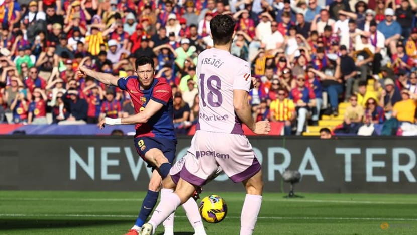 Lewandowski strikes twice as Barcelona beat Girona to take LaLiga lead