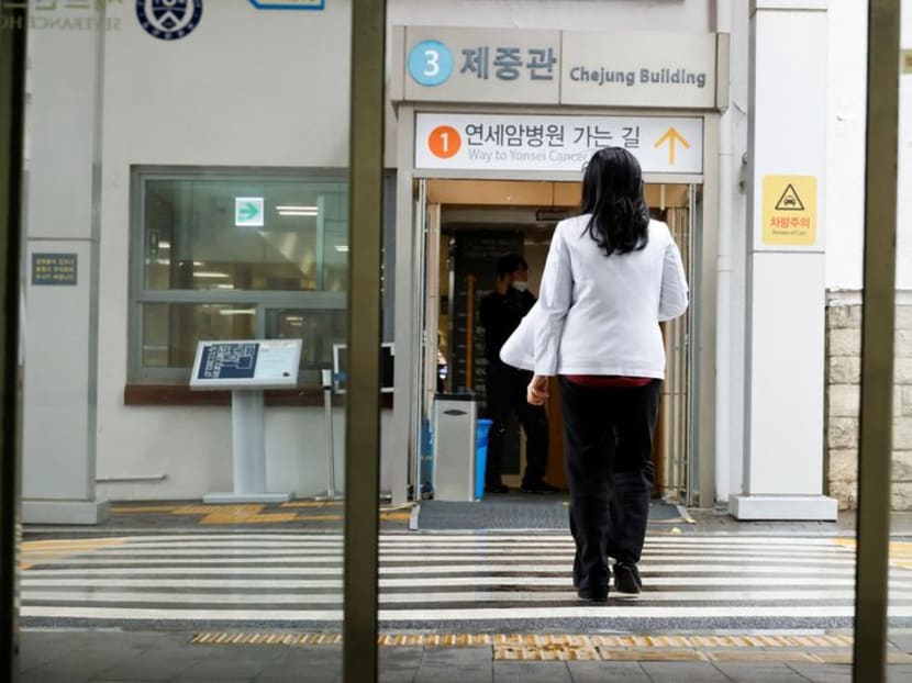 A medical worker walks at Severance Hospital in Seoul, South Korea, on Feb 21, 2024.