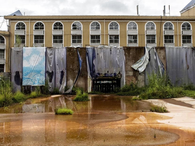 A hole in the lobby of Jingland Hotel, the former entrance to a demolished casino annex, in Boten, Laos. The one-time casino boomtown is trying to make a comeback, this time without casino-based gambling. Photo: The New York Times