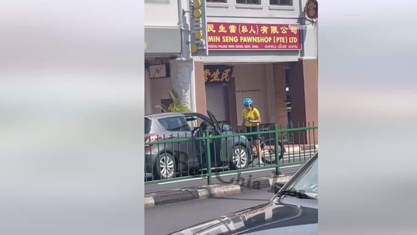 Car drives off with cyclist on bonnet after alleged altercation in Katong, 2 women assisting in police probe