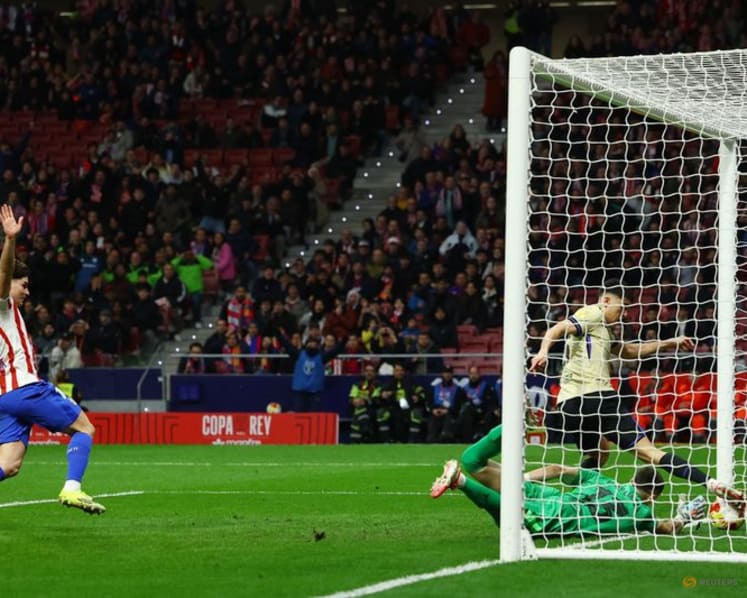Atletico hit Barcelona for four to take giant step toward Copa del Rey final